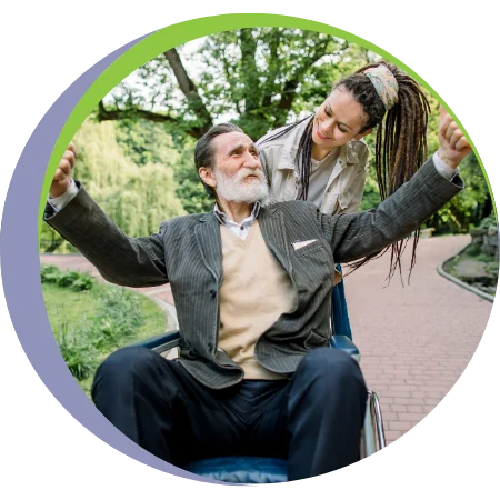 caregiver outside with senior man