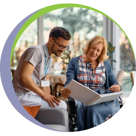 male caregiver hanging out with senior woman