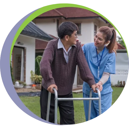 home nurse helping senior walk