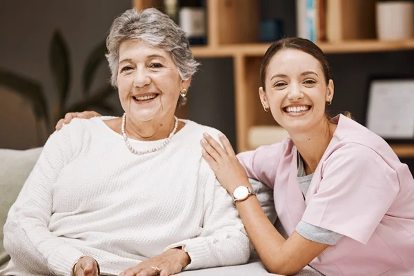 happy caregiver and senior client