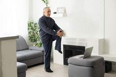 Senior man working out chair exercise