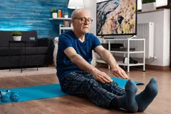 Senior man working out chair exercise